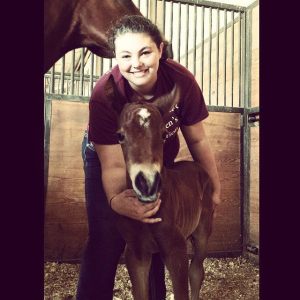 Cassie with a new baby at MSU!