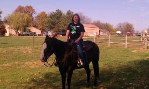 Kerstine and one of her horses, Blaze.